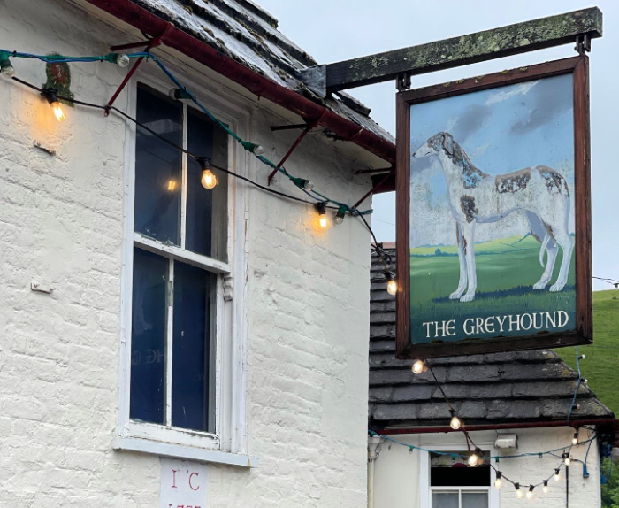 The Greyhound Inn sign